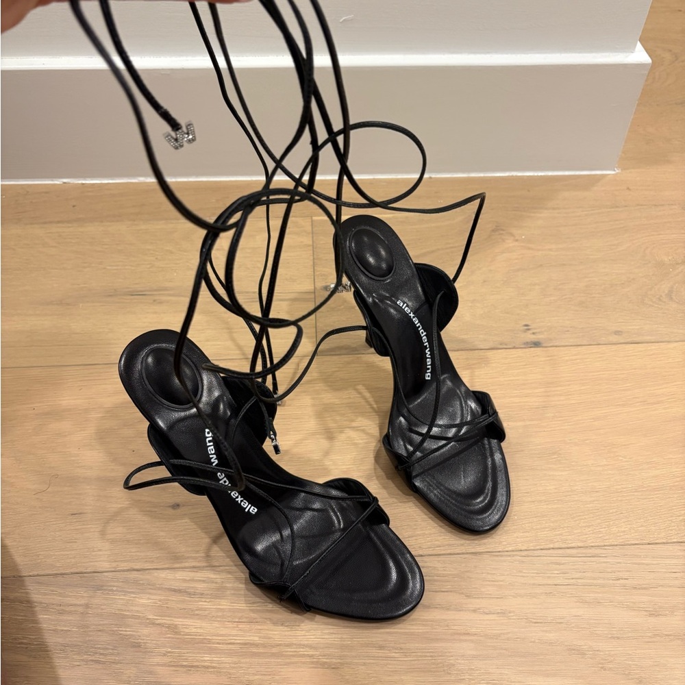Worn once, black strap up heel, come with box, 40.5